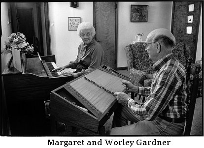 Worley and Margaret Gardner playing music in their home