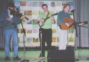 Chris Haddox (fiddle), Tim Hicks (banjo), and Ray Hicks (guitar)