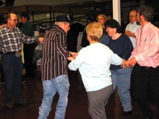 holding hands in a square dancing circle