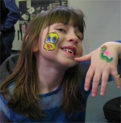 little girl with face painted